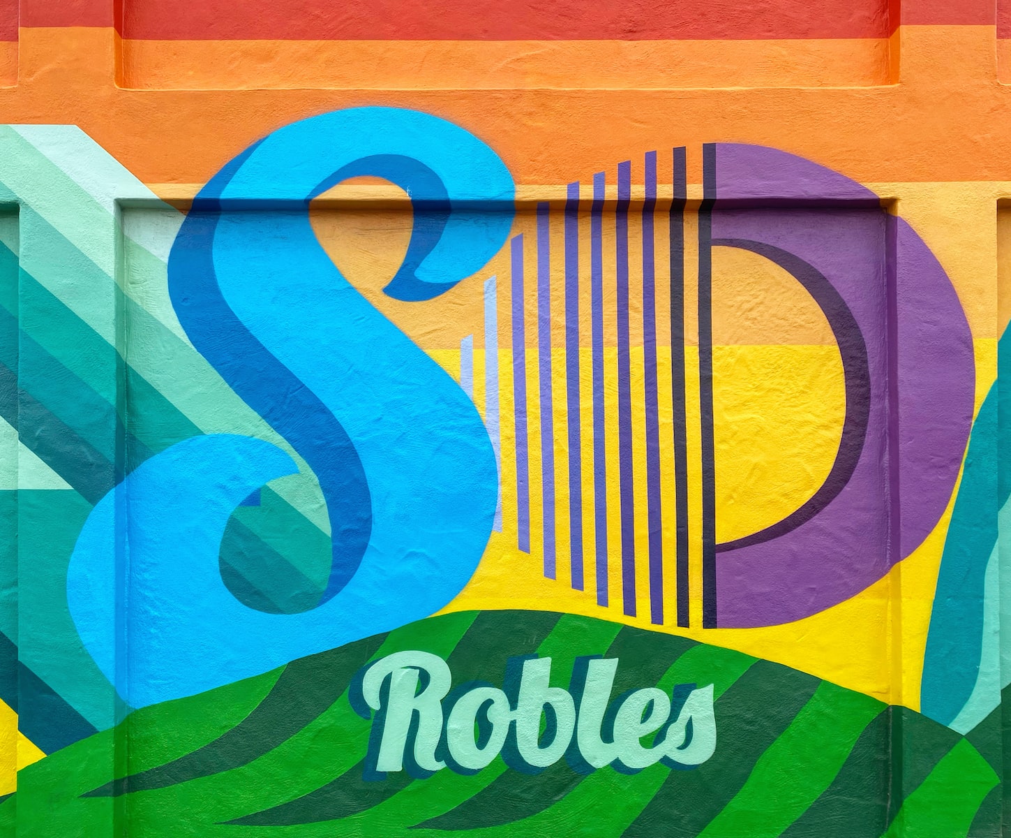 green and yellow wooden board Paso Robles Mural